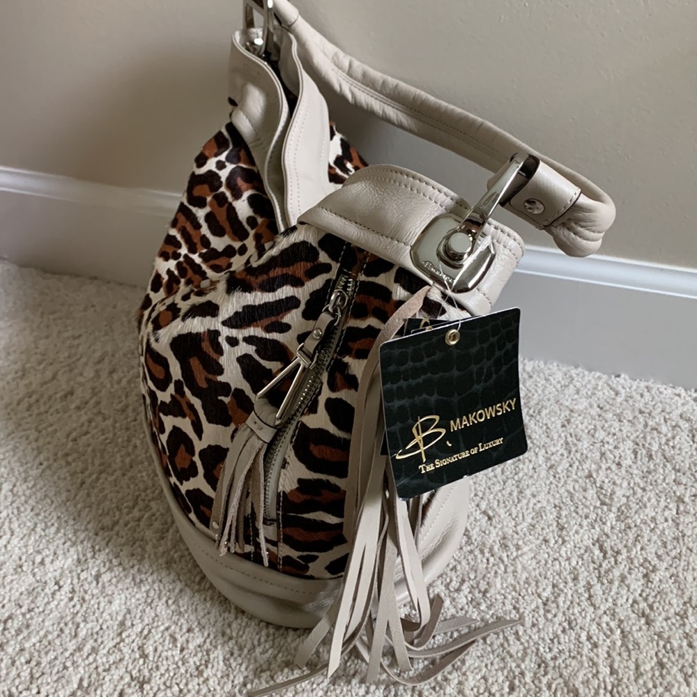B. Makowsky leather and cow hair bucket boho bag.- NWT- $298